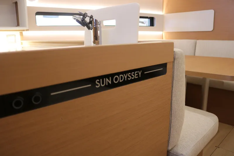 Slide: The Image of Interior of 2026 Jeanneau Sun Odyssey 415 yacht, featuring modern design and comfortable seating. - 29