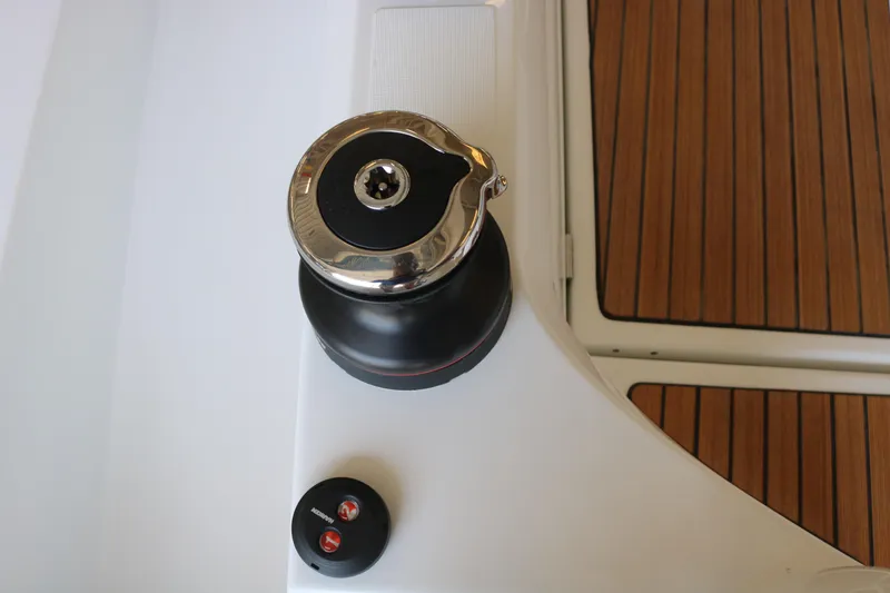 Slide: The Image of Winch and control panel on 2026 Jeanneau Sun Odyssey 415 yacht deck. - 11