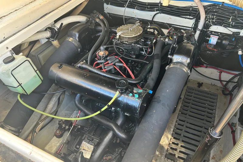 Slide: The Image of Engine compartment of a 1993 Tiara Yachts 3100 Open, showcasing mechanical components. - 29