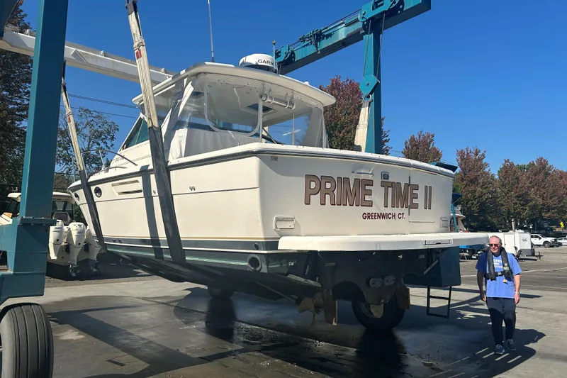 Slide: The Image of 1993 Tiara Yachts 3100 Open boat, "Prime Time II," in Greenwich, CT, on a lift. - 32