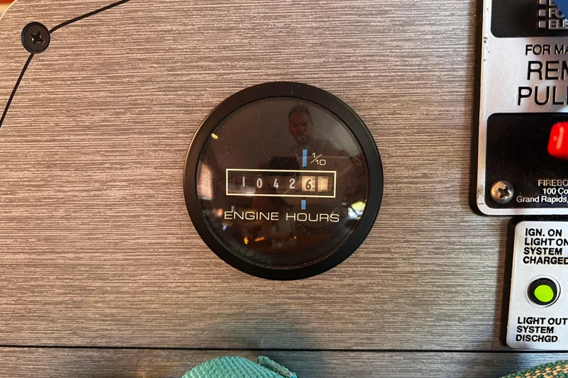 Slide: The Image of Engine hour meter reading 10426 on a 1994 Gibson 44 Classic boat dashboard. - 32