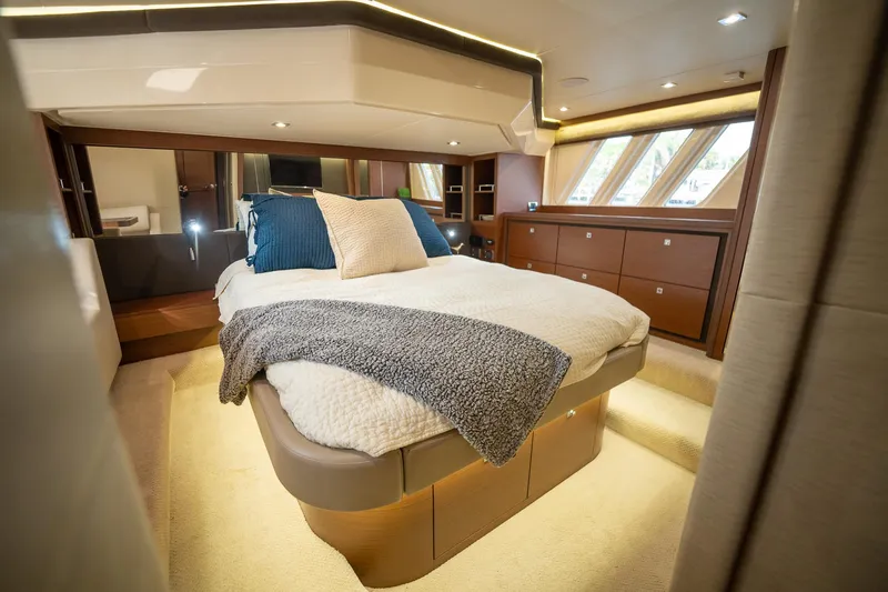 Slide: The Image of Luxurious master bedroom on 2016 Sea Ray 510 Fly yacht with modern decor. - 25