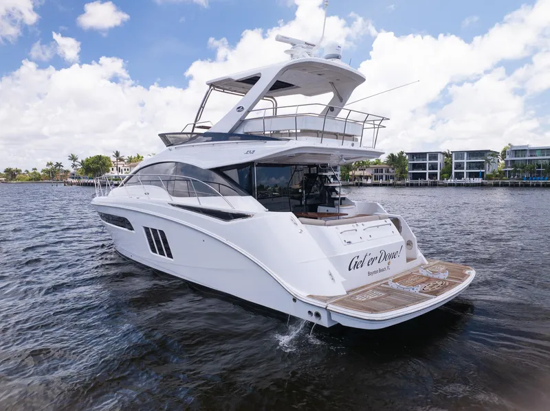 Slide: The Image of 2016 Sea Ray 510 Fly yacht cruising on a sunny day. - 7