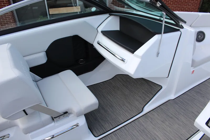 Slide: The Image of 2026 Four Winns H2 Freedom boat interior with sleek seating and modern design. - 15