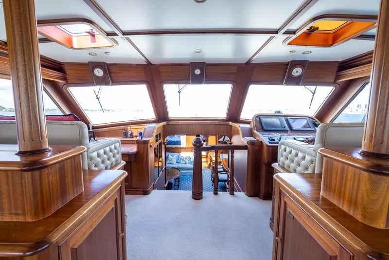 Slide: The Image of Luxurious interior of 2006 Vicem 85 Classic yacht with wood finishes and panoramic windows. - 24