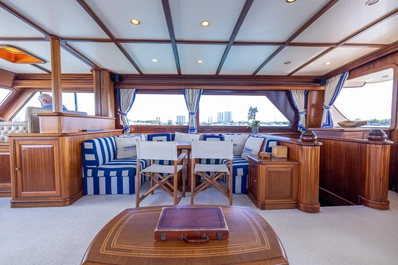 Slide: The Image of Luxurious interior of 2006 Vicem 85 Classic yacht with elegant wood and striped seating. - 26