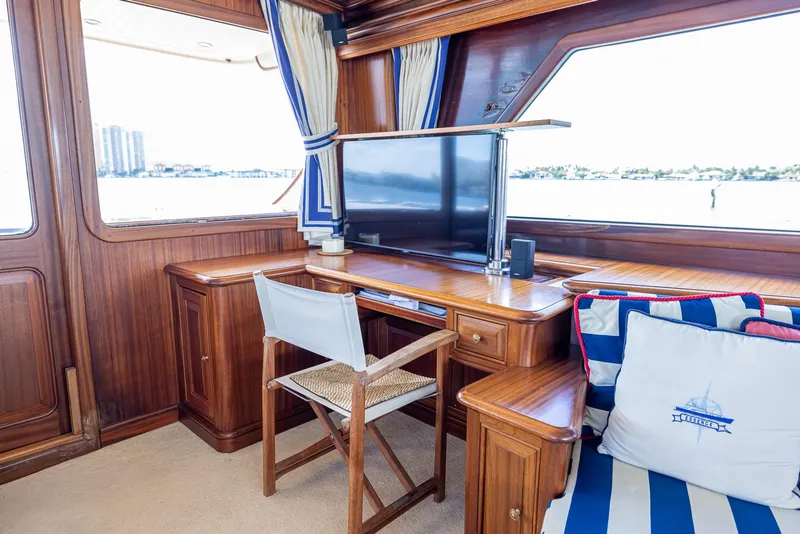 Slide: The Image of Luxurious interior of 2006 Vicem 85 Classic yacht with wooden desk and seating. - 27