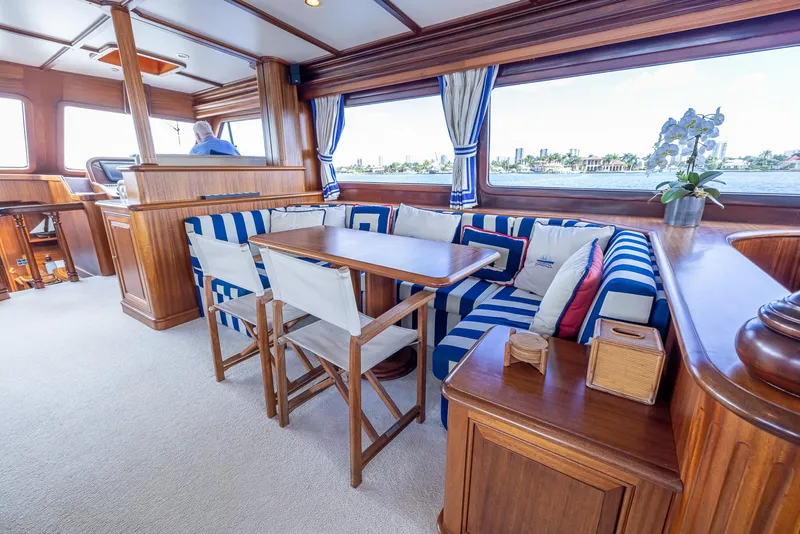 Slide: The Image of Interior of 2006 Vicem 85 Classic yacht with striped seating and wooden furnishings. - 28