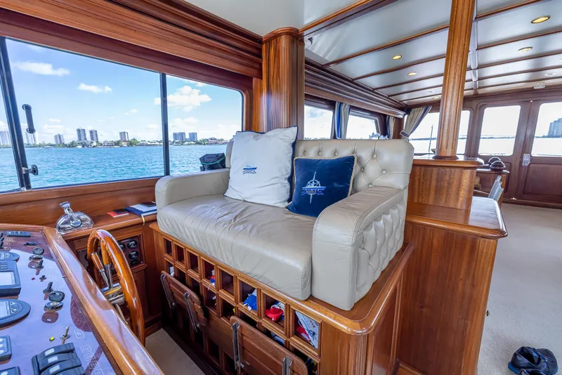 Slide: The Image of Luxurious 2006 Vicem 85 Classic yacht interior with plush seating and scenic water view. - 31
