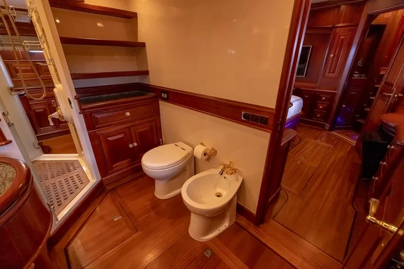 Slide: The Image of Luxurious bathroom on 2006 Vicem 85 Classic yacht with wood accents and modern fixtures. - 40