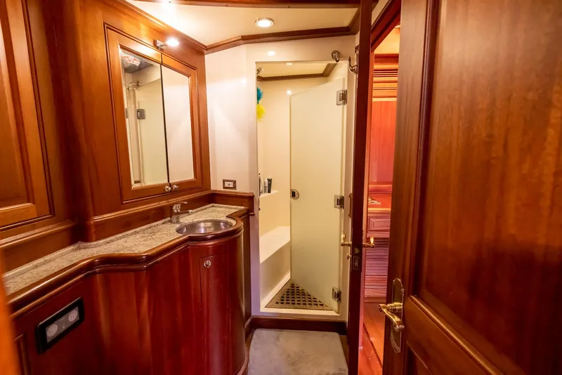 Slide: The Image of Luxurious wooden bathroom interior on a 2006 Vicem 85 Classic yacht. - 48