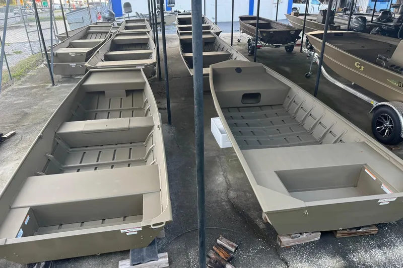 The Image of 2026 G3 Gator Tough 1436 boats displayed in a showroom, showcasing durable design. - 1