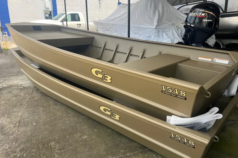 Slide: The Image of 2026 G3 Gator Tough 1436 boats stacked, featuring Yamaha outboard motor. - 12