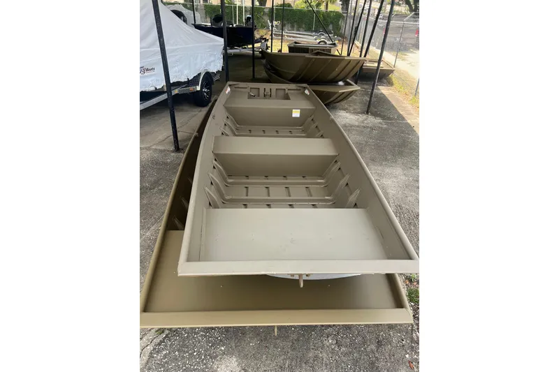 Slide: The Image of 2026 G3 Gator Tough 1436 boat, displayed outdoors, showcasing its durable design. - 9