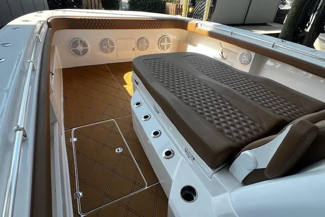 Slide: The Image of Luxurious interior of 2024 Invincible 46 Catamaran with brown seating and modern design. - 60