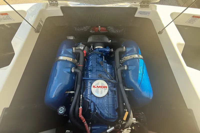 Slide: The Image of 2021 MasterCraft NXT24 engine compartment featuring Ilmor engine. - 17