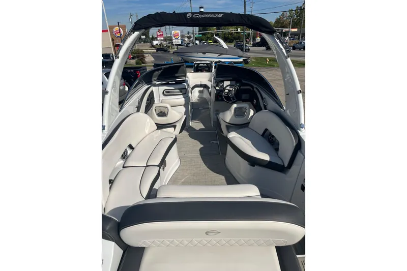 Slide: The Image of 2021 Crownline 290 SS boat interior with luxurious seating and modern design. - 21