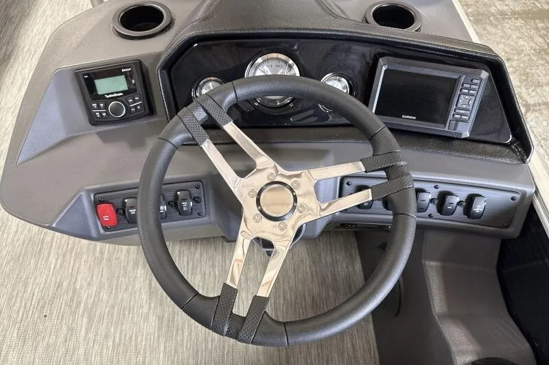 Slide: The Image of Steering console of 2026 Bennington 22 SSRSF boat with modern controls and gauges. - 21