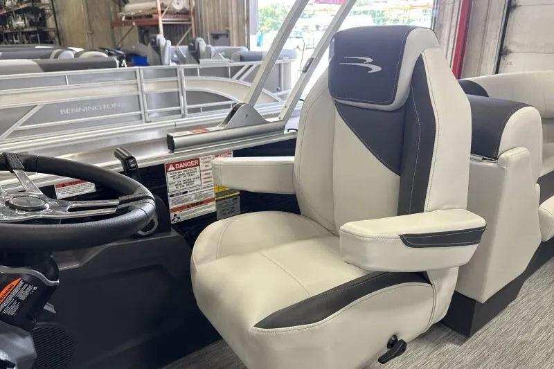 Slide: The Image of Captain's chair in 2026 Bennington 22 SSRSF pontoon boat, featuring sleek design and comfortable seating. - 23