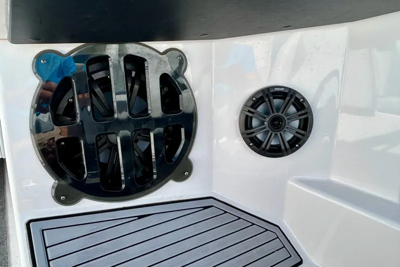 Slide: The Image of 2018 Moomba Helix boat interior with speakers and non-slip flooring. - 28