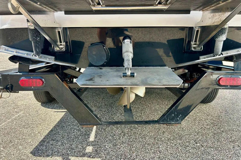 Slide: The Image of Rear view of a 2018 Moomba Helix boat showing propeller and trailer. - 37