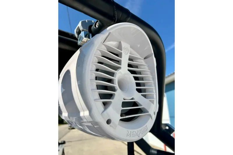 Slide: The Image of White Memphis speaker mounted on a 2018 Moomba Helix boat. - 38