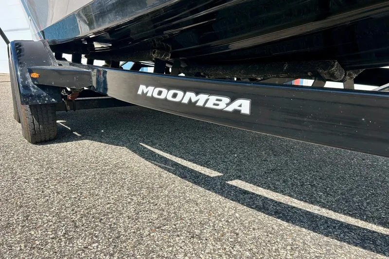 Slide: The Image of 2018 Moomba Helix boat trailer on asphalt, showcasing brand logo. - 6