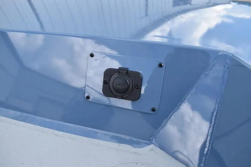 Slide: The Image of Open storage compartment on 2026 Lowe Roughneck RX2070 CC boat. - 18