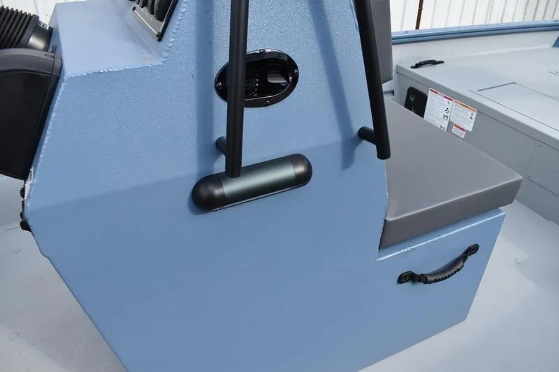 Slide: The Image of 2026 Lowe Roughneck RX2070 CC boat on trailer, parked outdoors. - 2