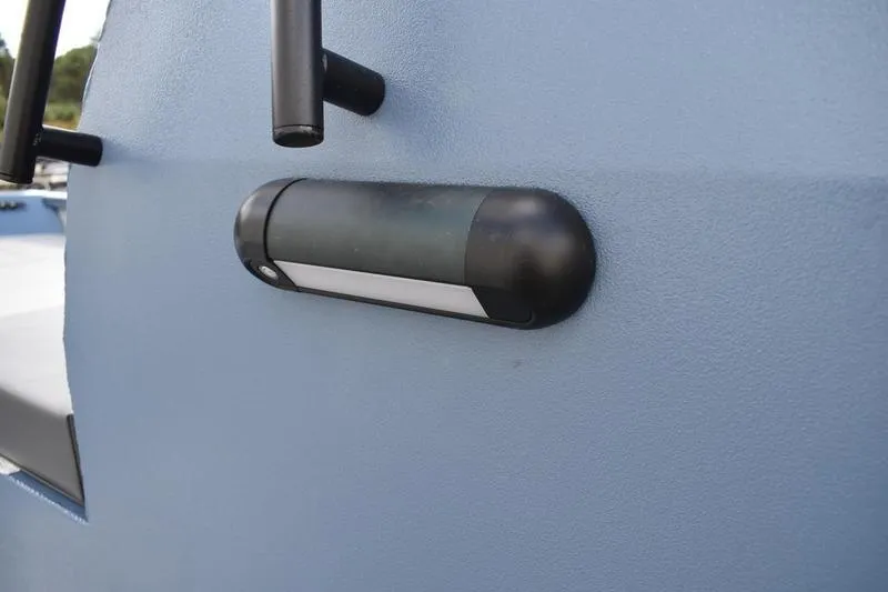 Slide: The Image of Fuel gauge on 2026 Lowe Roughneck RX2070 CC boat dashboard. - 33