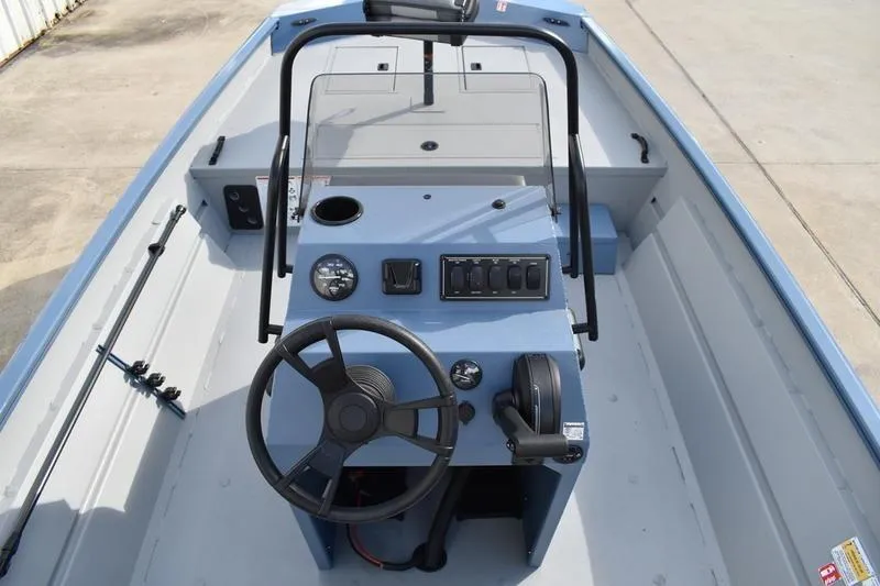Slide: The Image of 2026 Lowe Roughneck RX2070 CC boat deck with seating and storage compartments. - 37