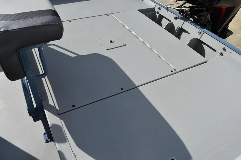 Slide: The Image of Trailer hitch of 2026 Lowe Roughneck RX2070 CC boat on concrete surface. - 41