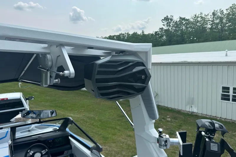 Slide: The Image of 2025 Nautique Super Air Nautique G23 boat with advanced speaker system and sleek design. - 17