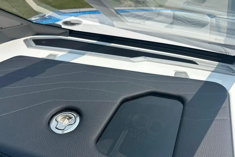 Slide: The Image of 2025 Nautique Super Air Nautique G23 dashboard with centennial edition detailing. - 23