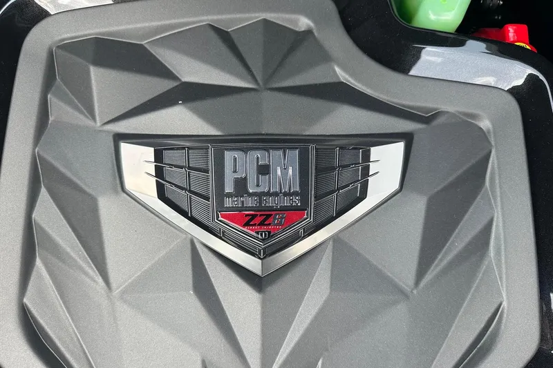 Slide: The Image of 2025 Nautique Super Air Nautique G23 PCM engine cover with ZZ8 emblem. - 7
