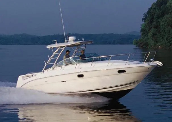 Slide: The Image of 2008 Sea Ray 290 Amberjack helm with navigation instruments and steering wheel. - 17