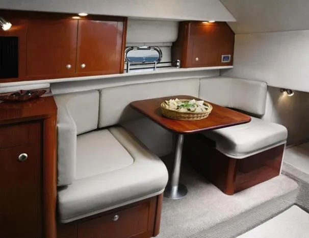 Slide: The Image of 2008 Sea Ray 290 Amberjack helm with navigation instruments and steering wheel. - 20