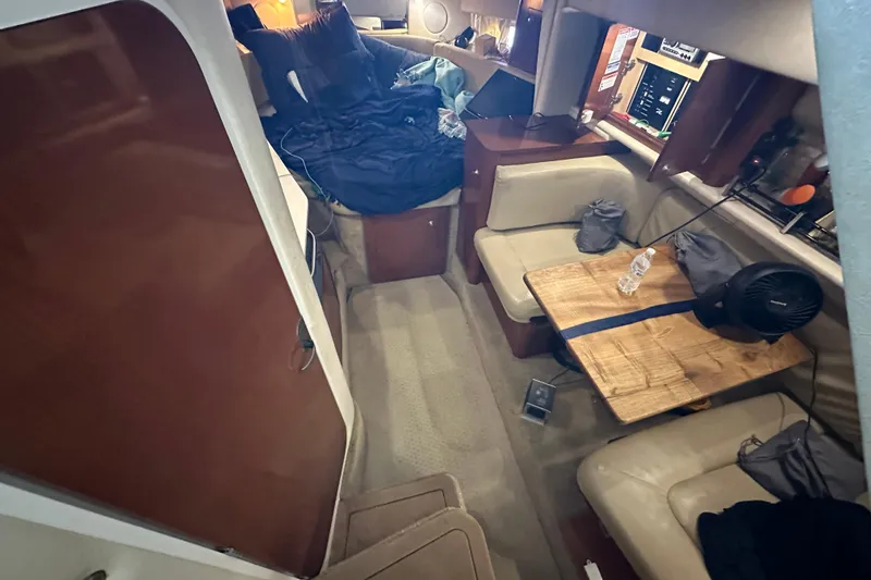 Slide: The Image of Interior of 2008 Sea Ray 290 Amberjack boat with seating and table. - 32