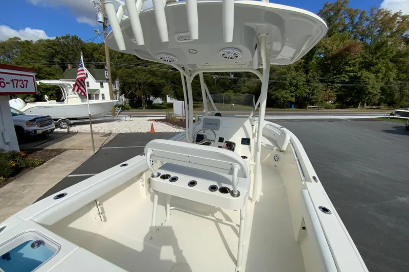 Slide: The Image of 2025 Cobia 220 Center Console boat with spacious deck and modern features. - 12