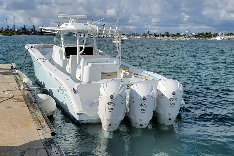 Slide: The Image of 2022 Yellowfin 42 Offshore boat docked with triple 425 V8 engines. - 13
