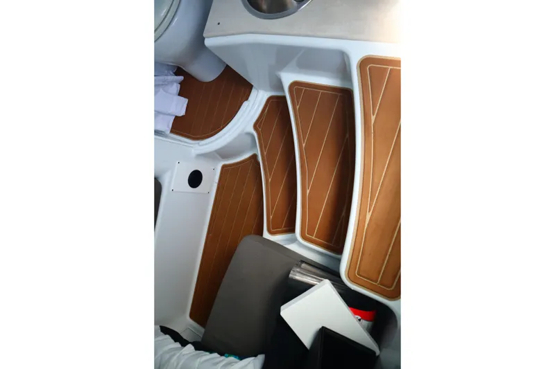 Slide: The Image of 2022 Yellowfin 42 Offshore interior with wooden steps and modern design. - 28