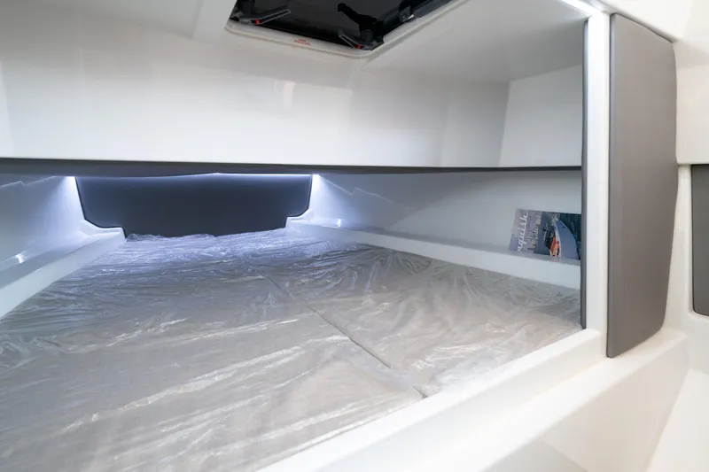 Slide: The Image of 2023 Vanquish Yachts Sports Line Outboard interior cabin with sleek modern design. - 18