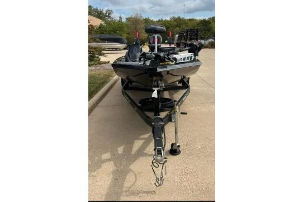 Slide: The Image of 2018 Ranger RT198P fishing boat on trailer, parked outdoors. - 3