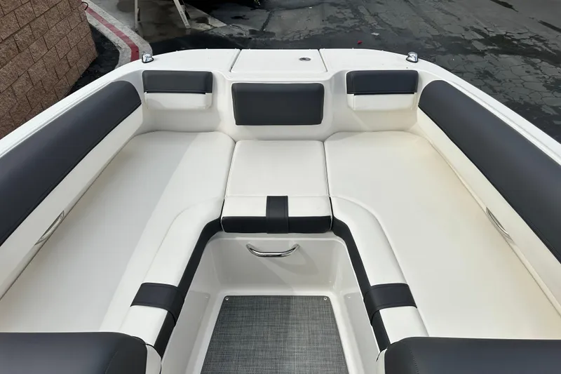Slide: The Image of 2021 Bayliner DX 2050 boat engine compartment with Mercury 4.5L 200 HP engine. - 19