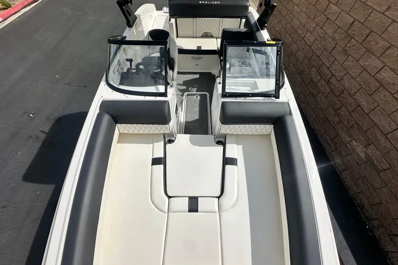 Slide: The Image of 2021 Bayliner DX 2050 boat engine, featuring a Mercury 200 horsepower motor. - 21