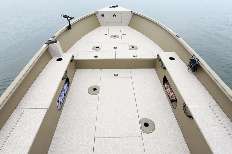 Slide: The Image of Manufacturer Provided Image: 2025 Lund 2075 Alaskan Tiller boat interior with spacious deck and storage compartments. - 18