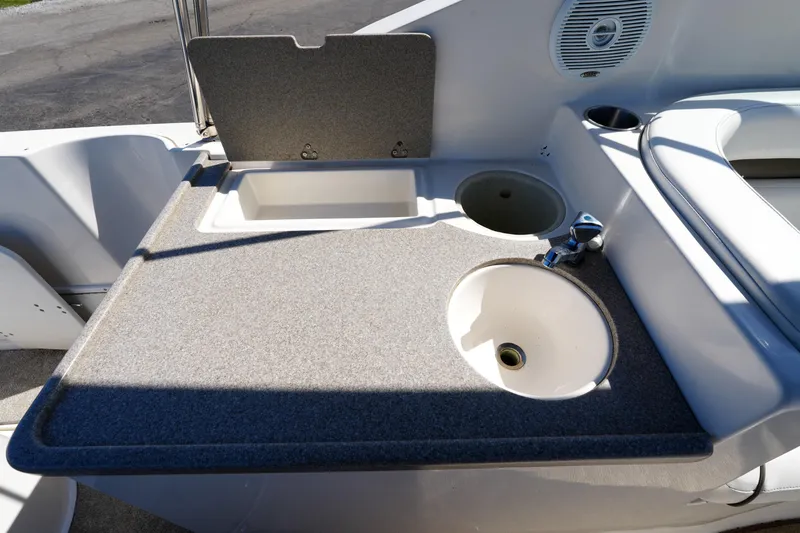 Slide: The Image of 2007 Rinker 280 Fiesta Vee boat interior with sink and countertop. - 13