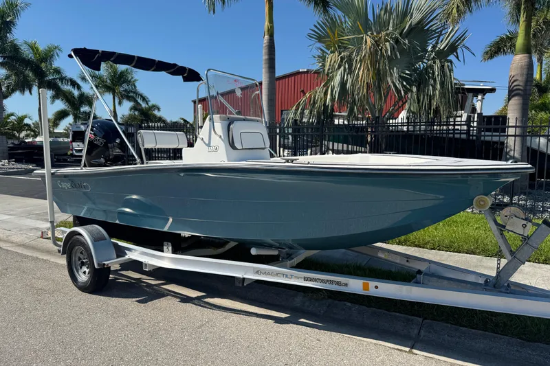 The Image of 2019 Cape Craft 180 boat on trailer, parked near palm trees. - 0