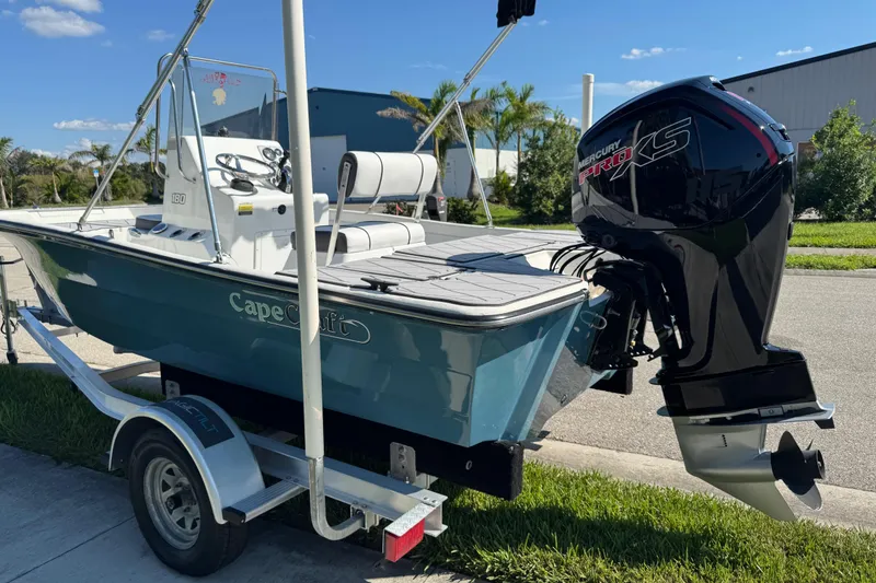 Slide: The Image of 2019 Cape Craft 180 boat with Mercury Pro XS engine on trailer, parked outdoors. - 10