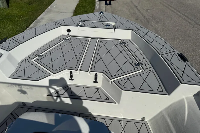 Slide: The Image of 2019 Cape Craft 180 boat deck with gray diamond-patterned non-slip surface. - 15